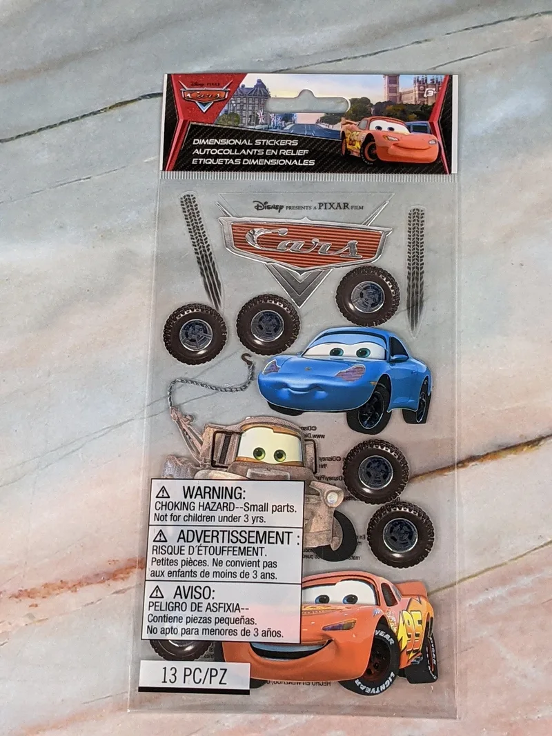 A sheet of Disney Pixar Cars themed dimensional stickers.