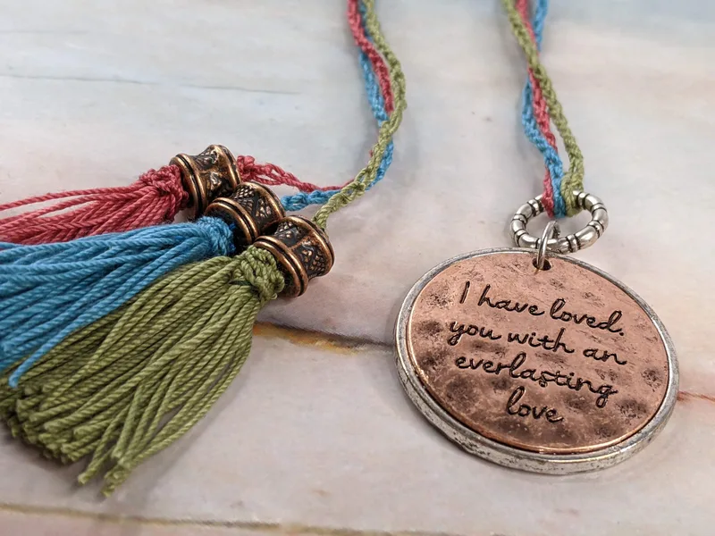 "I have loved you with an everlasting love" ("Jeremiah 31:3" on back) Scripture Pendant Bookmark with 3 crocheted tassel strands, green, blue, and pink!