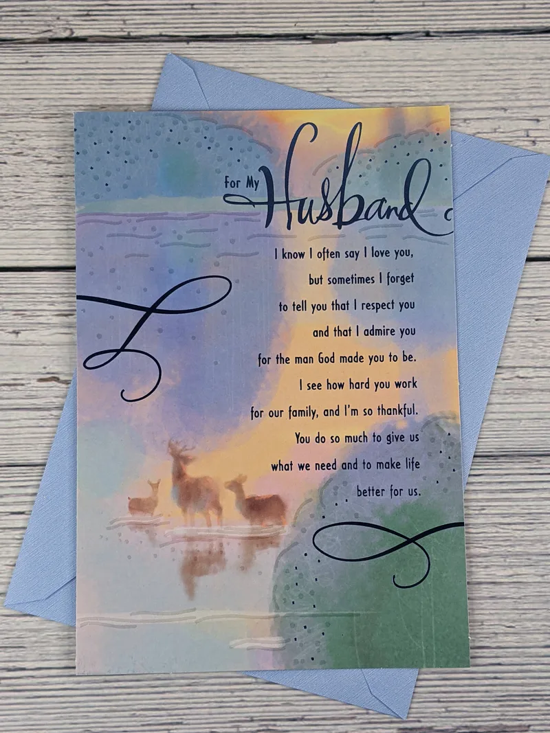 A Father's Day greeting card for a husband, with a religious message, and an image of deer on a watercolor background.