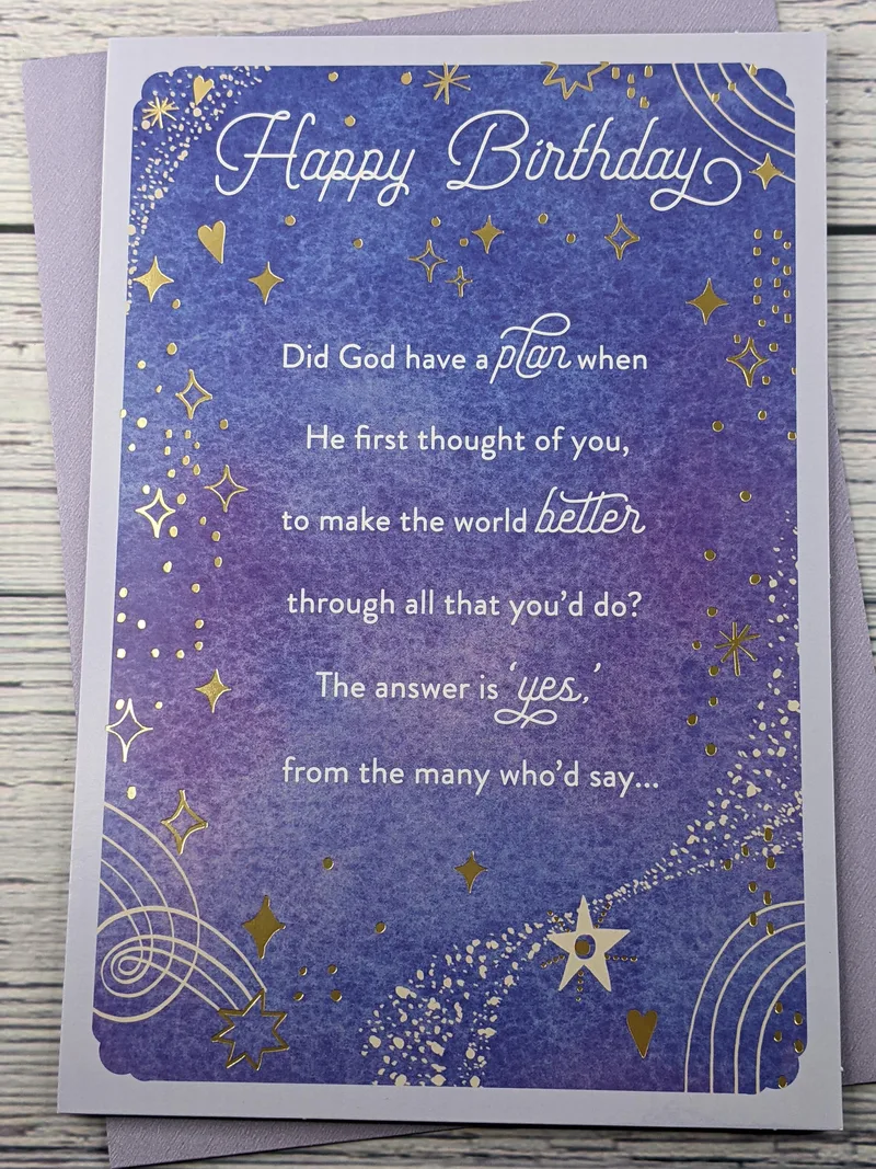 A blue birthday card with a religious message.
