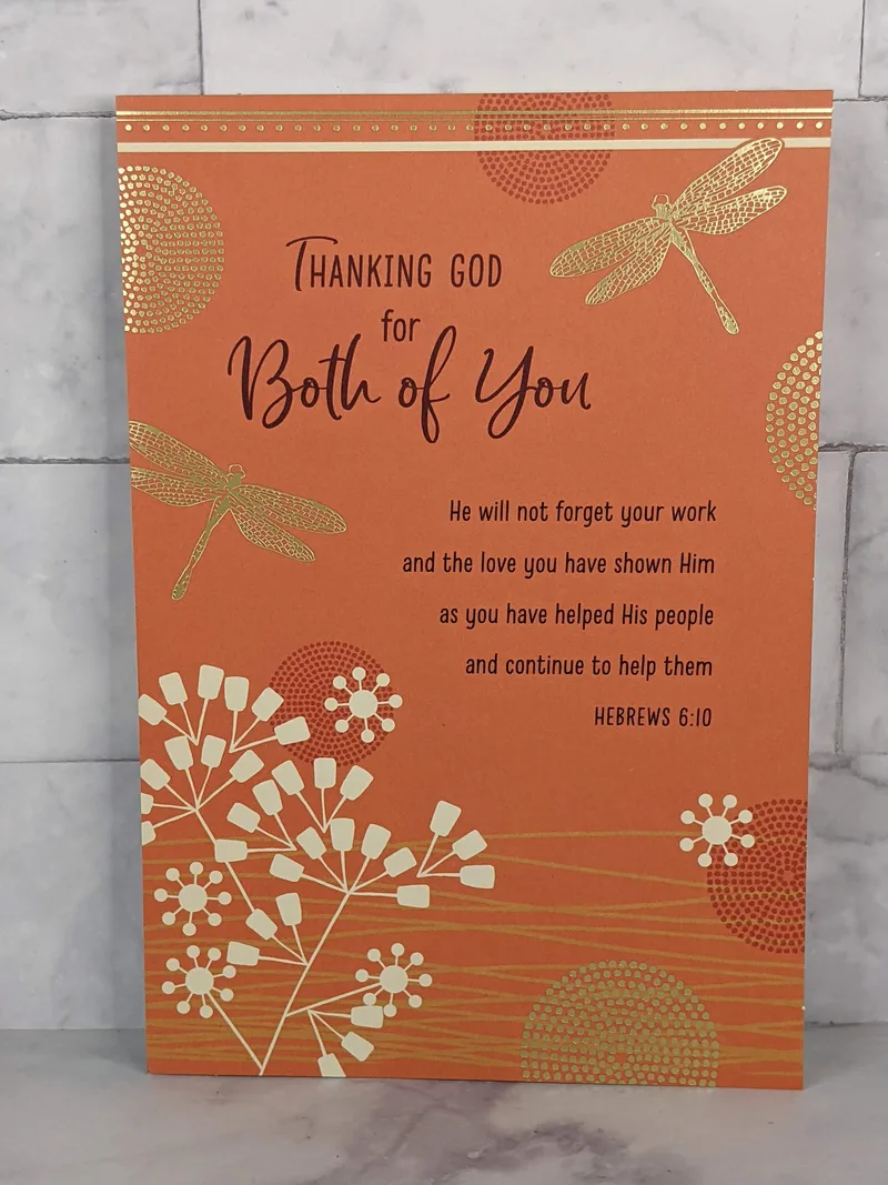 A religious ministry appreciate card for a couple with an orange cover.