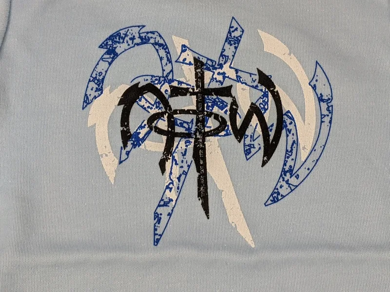 A one-piece baby outfit shirt that is light blue with a NOTW logo.