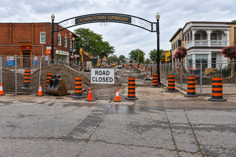 Grimsby Downtown BIA presents a $20,000 cheque to Happening in Grimsby in June 2026