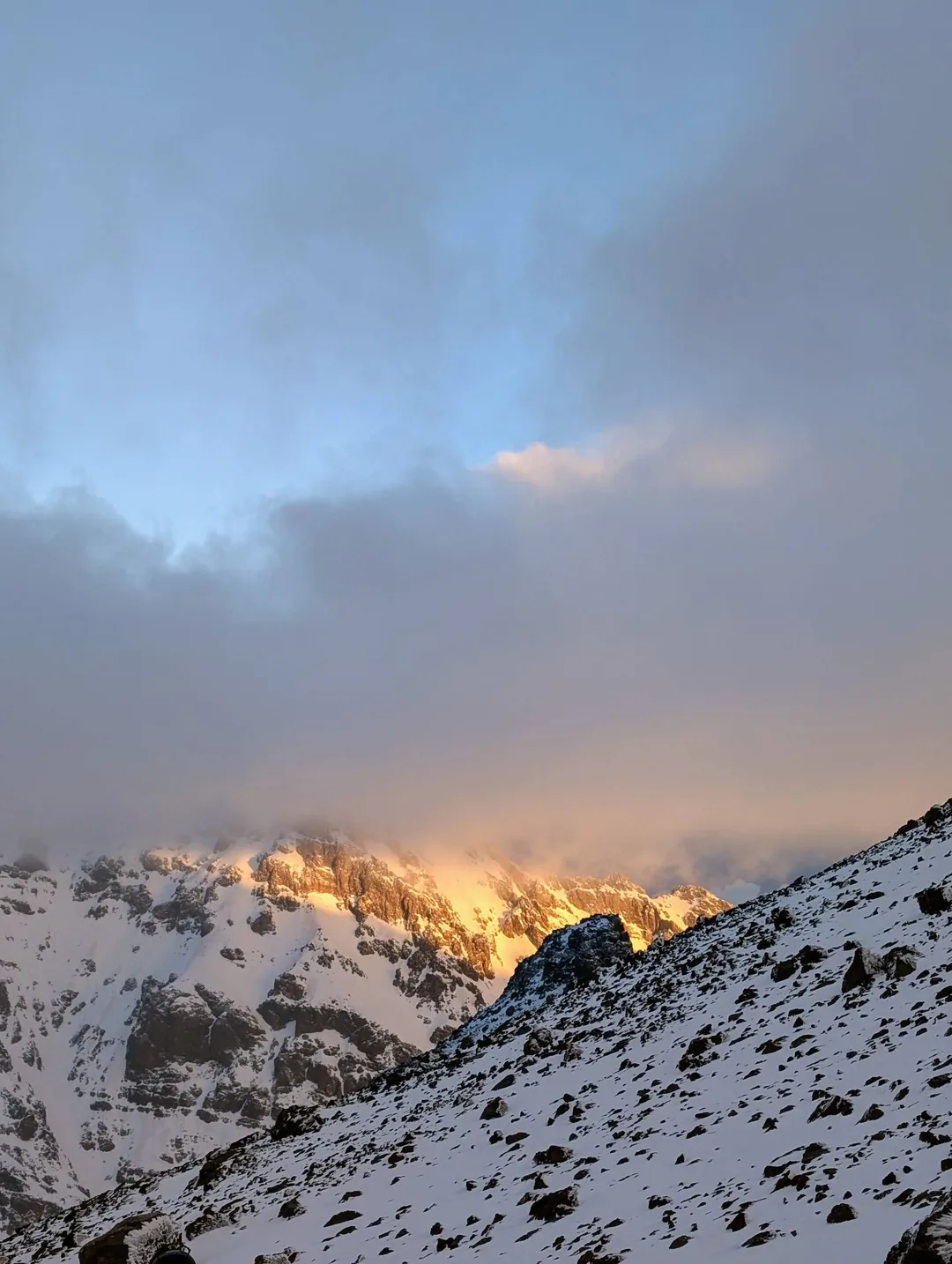 Sunrise on snowy mountains.