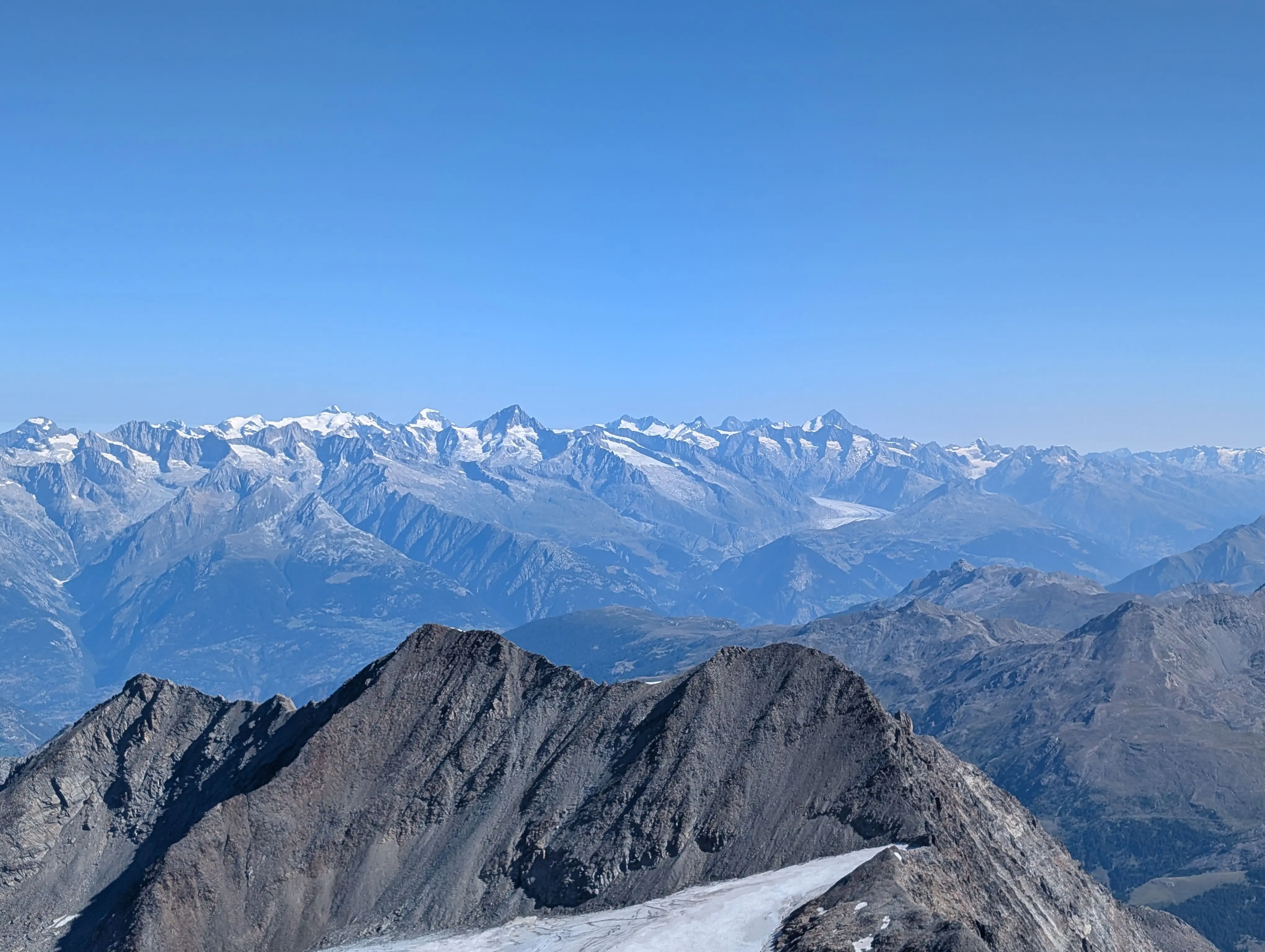 View from the northeast ridge towards the Bernese Alps