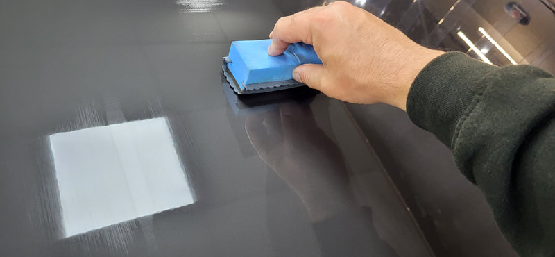 Ceramic Coating being applied to bonnet of Volvo at DMD Car Detailing in Paisley