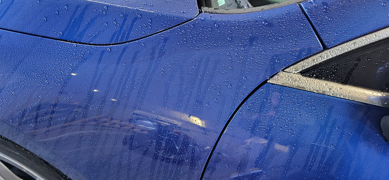 Water beading on Mercedes after Ceramic Coating at DMD Car Detailing near Greenock