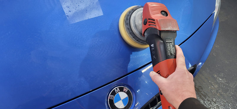 BMW during paint correction at DMD Car Detailing near Hillington