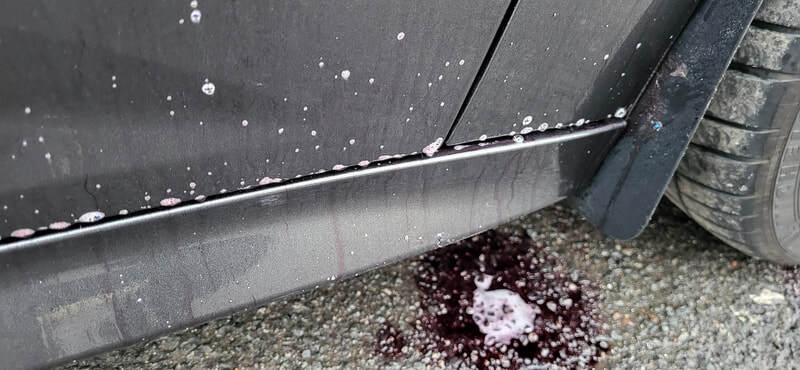 Fallout remover (or iron remover) dissolving bonded ferrous metal particles—such as industrial fallout, rail dust, and brake dust from the Focus RS paintwork at DMD Car Detailing