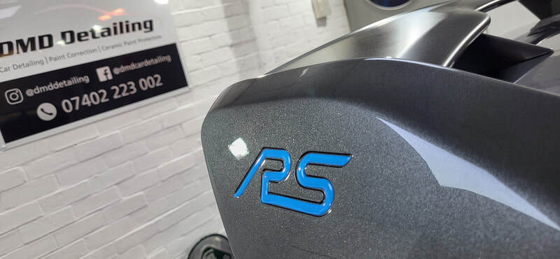 Swirl-free finish revealed under direct light after correction