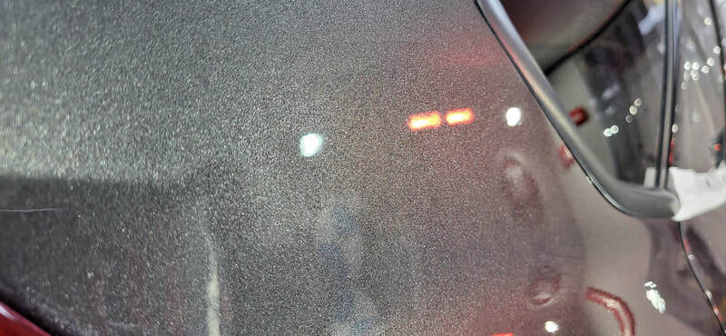 Close-up of corrected paintwork showing improved clarity and gloss at DMD Car Detailing in Paisley