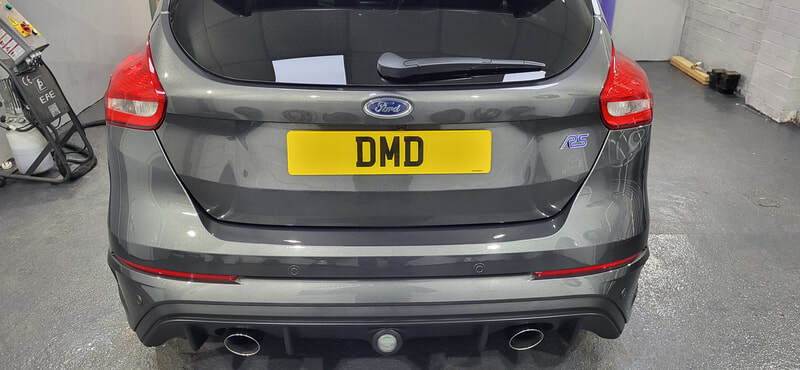 Rear view of Magnetic Grey Focus RS after paint correction and ceramic protection