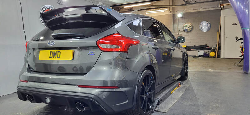 Rear view of Ford Focus RS finished with ceramic coating showing deep gloss
