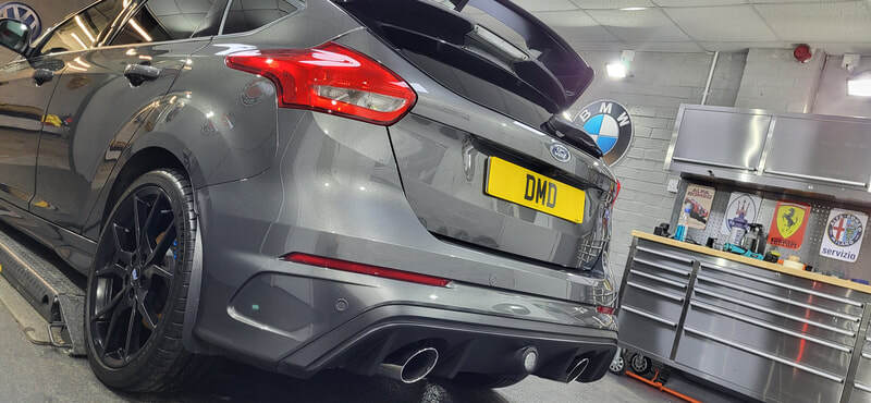 Close up of rear of Ford Focus RS finished with ceramic coating showing deep gloss