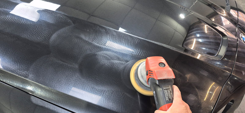 BMW M3 Touring during paint correction at DMD Car Detailing near Renfrew