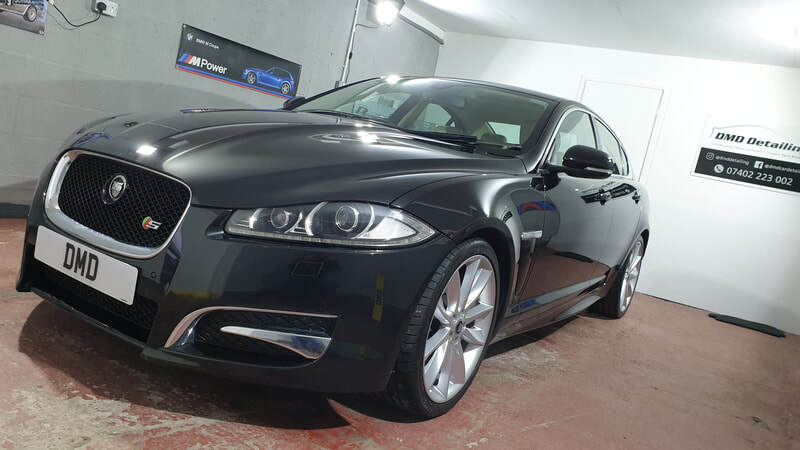 Jaguar XF after undergoing machine polishing and ceramic coating at DMD Car Detailing in Paisley near Glasgow.