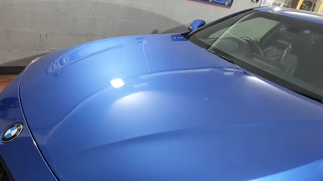 Bonnet of BMW 4 series coupe after two stage paint correction in Paisley at DMD Car Detailing