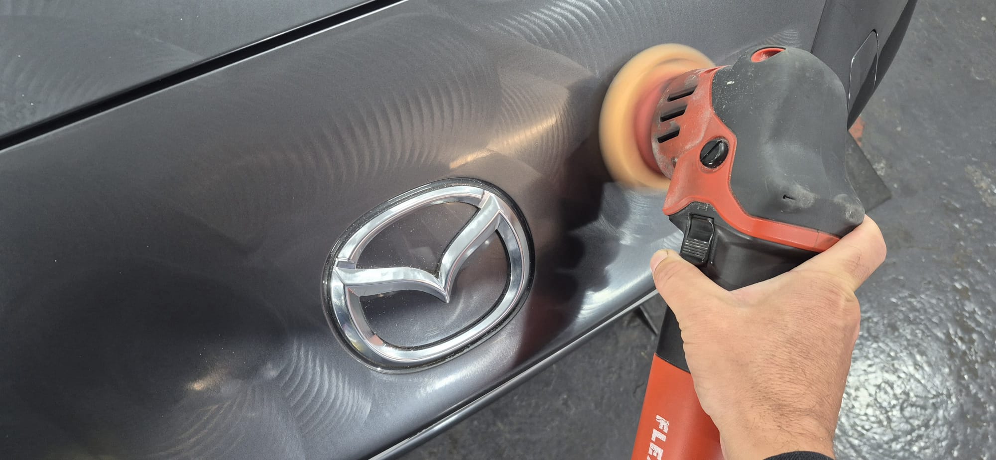 Mazda MX-5 going through paint correction at in Paisley at DMD Car Detailing near Barrhead
