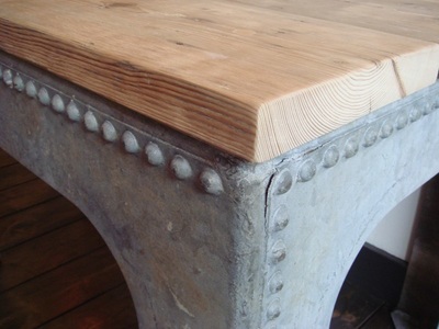 Detail of an upcycled water tank coffee table